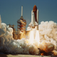 Imagen para el artículo titulado Por qué cambió el color del enorme tanque de combustible de los transbordadores de la NASA